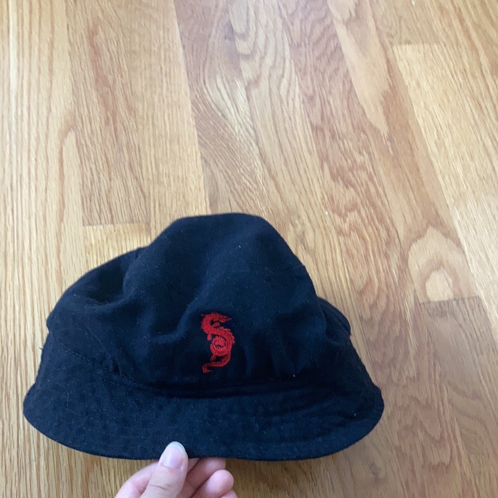 Black bucket hat with red dragon